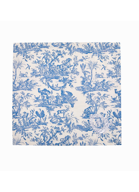 Blue toile de jouy floral patterned napkins with royal emblem embroidery