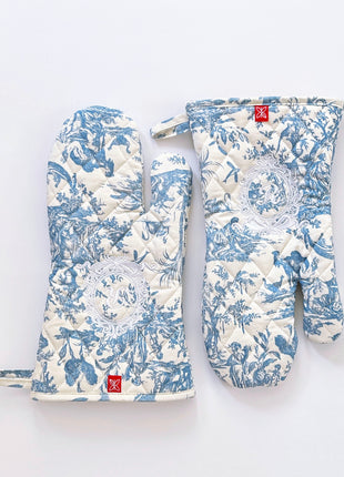 Pair of blue toile de jouy patterned ovenmitts with royal emblem embroidery 