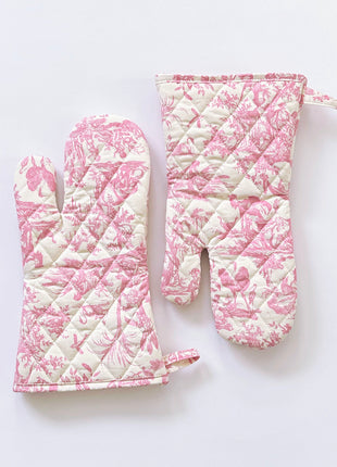 Pair of pink toile de jouy patterned ovenmitts with royal emblem embroidery 