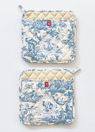 Pair of blue toile de jouy patterned pot holders with royal emblem embroidery 